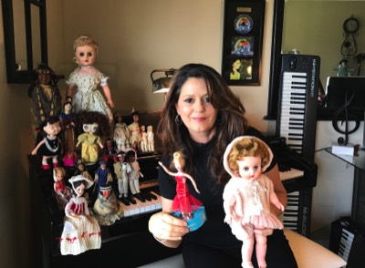 Laura With Her Dolls